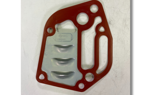 Прокладка кронштейна оливного фiльтра (06A115441J) 2